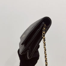 Load image into Gallery viewer, Chanel black caviar woc, gold hdw, with magnetic closure.
