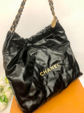 Load image into Gallery viewer, Chanel 22 medium black calfskin, gold hdw
