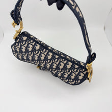Load image into Gallery viewer, Dior blue oblique monogram jacquard medium saddle bag, with gold hardware and guitar strap