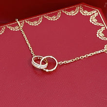 Load image into Gallery viewer, Cartier 18K rose gold double rings love pendant, half-paved diamond