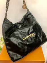 Load image into Gallery viewer, Chanel 22 medium black calfskin, gold hdw
