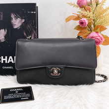 Load image into Gallery viewer, Chanel medium classic flap two tone black and blue with silver hdw.