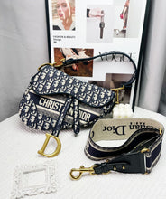Load image into Gallery viewer, Dior blue oblique monogram jacquard medium saddle bag, with gold hardware and guitar strap