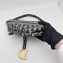 Load image into Gallery viewer, Dior blue oblique monogram jacquard medium saddle bag, with gold hardware and guitar strap