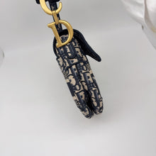 Load image into Gallery viewer, Dior blue oblique monogram jacquard medium saddle bag, with gold hardware and guitar strap