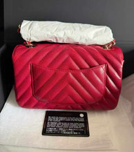 Load image into Gallery viewer, Chanel 18B raspberry red mini caviar chevron, with light gold hardware