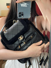 Load image into Gallery viewer, Chanel shearling and lambskin backpack black, gold hdw