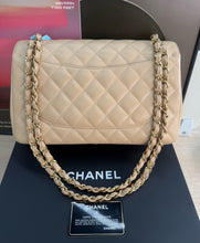 Load image into Gallery viewer, Chanel double flap jumbo beige caviar with gold hardware.