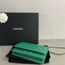 Load image into Gallery viewer, Chanel woc green lambskin with gold hdw.