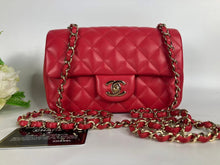 Load image into Gallery viewer, Chanel Pink/red mini lambskin with gold hdw.