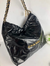 Load image into Gallery viewer, Chanel 22 medium black calfskin, gold hdw