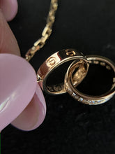 Load image into Gallery viewer, Cartier 18K rose gold double rings love pendant, half-paved diamond