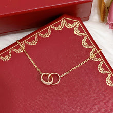 Load image into Gallery viewer, Cartier 18K rose gold double rings love pendant, half-paved diamond