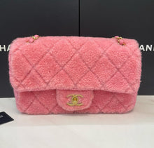 Load image into Gallery viewer, Chanel bag medium pink fur with gold hardware.
