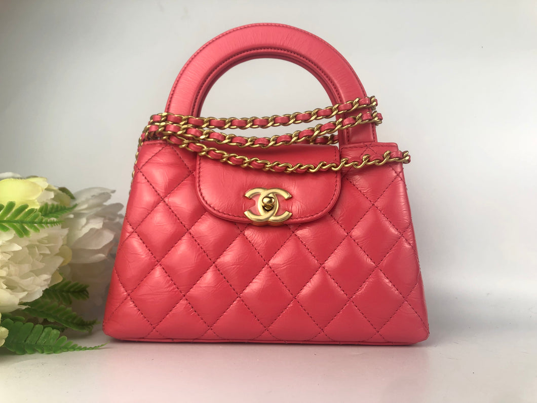 Chanel 23k dark pink Kelly, gold hdw (larger size)