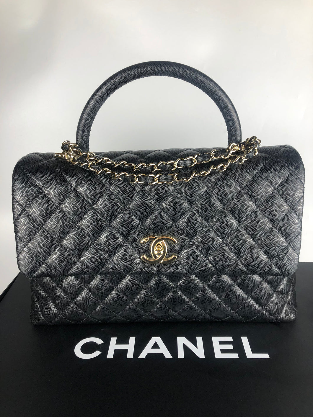 Chanel large black caviar coco handle, light gold hardware