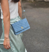 Load image into Gallery viewer, 22c Chanel denim pearl crush woc wallet on chain, gold hdw
