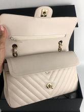 Load image into Gallery viewer, Chanel 18b ivory chevron caviar medium classic with light gold hdw
