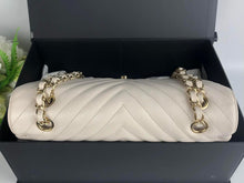 Load image into Gallery viewer, Chanel ivory caviar chevron medium, gold champagne hardware
