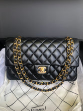 Load image into Gallery viewer, Chanel 31 series black lambskin medium flap, gold hardware
