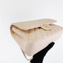 Load image into Gallery viewer, Chanel 22c light beige caviar medium classic flap, light gold hdw
