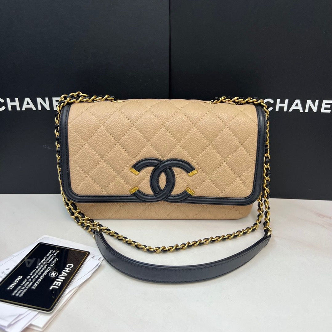 Chanel small beige black filigree caviar