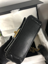 Load image into Gallery viewer, Chanel Black caviar coins mini with aged gold hdw
