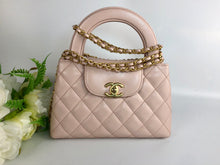 Load image into Gallery viewer, Chanel Kelly light pink, with aged gold hdw
