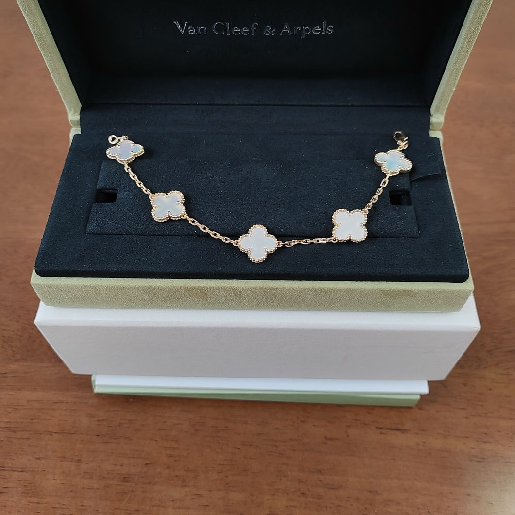 Van Cleef & Arpels (VCA) vintage Alhambra 18k gold bracelet, mother of pearl 5 motifs
