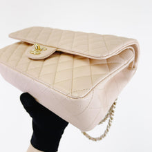Load image into Gallery viewer, Chanel 22c light beige caviar medium classic flap, light gold hdw
