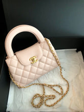 Load image into Gallery viewer, Chanel Light pink calfskin Kelly (larger size) with aged gold hdw
