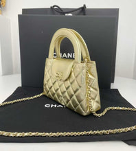 Load image into Gallery viewer, Chanel gold Kelly shopper nano (larger size) in shiny gold calfskin, gold hdw
