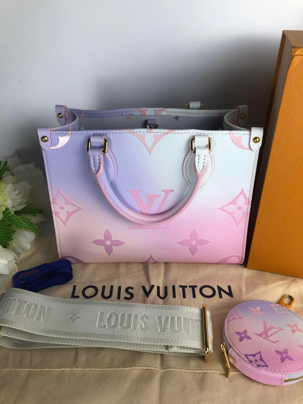 Louis Vuitton On-The-Go sunrise pastel PM with strap, pouch