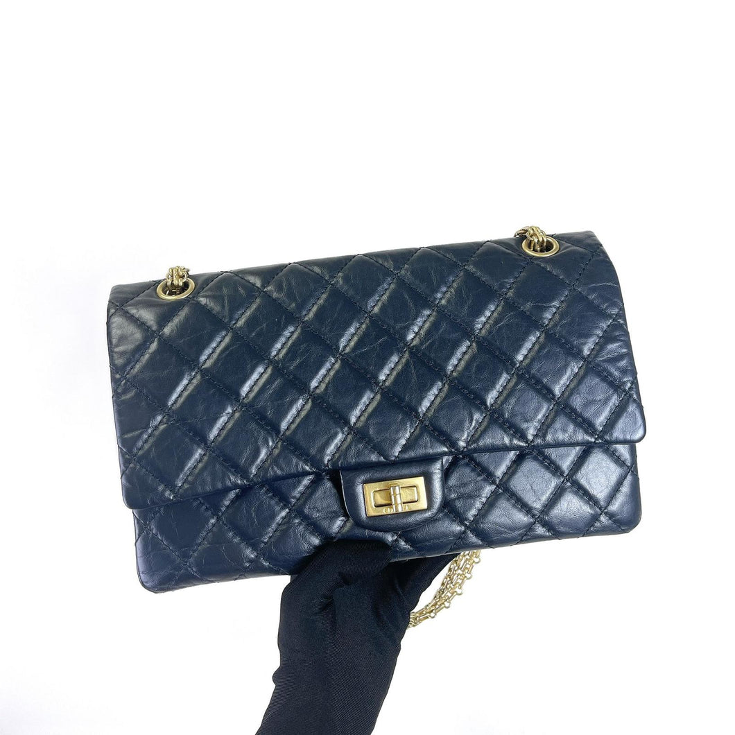 Chanel reissue navy, with gold hdw 28cm