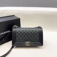 Load image into Gallery viewer, Chanel old medium boy black caviar with ruthenium hardware
