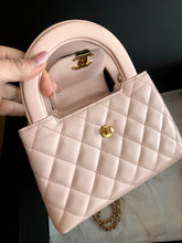 Load image into Gallery viewer, Chanel Light pink calfskin Kelly (larger size) with aged gold hdw
