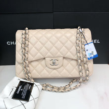 Load image into Gallery viewer, Chanel beige caviar jumbo with silver hdw
