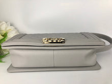 Load image into Gallery viewer, Chanel light grey old medium caviar boy, light gold hdw
