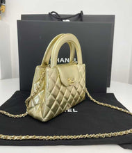 Load image into Gallery viewer, Chanel gold Kelly shopper nano (larger size) in shiny gold calfskin, gold hdw
