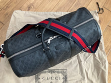 Load image into Gallery viewer, Gucci large black supreme duffle bag, with strap
