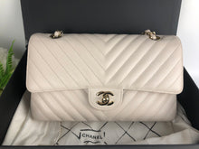 Load image into Gallery viewer, Chanel 18b ivory chevron caviar medium classic with light gold hdw
