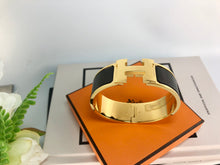 Load image into Gallery viewer, Hermes black / gold clic clac GM
