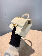 Load image into Gallery viewer, Chanel white caviar mini top handle with aged gold hdw
