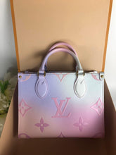 Load image into Gallery viewer, Louis Vuitton On-The-Go sunrise pastel PM with strap, pouch
