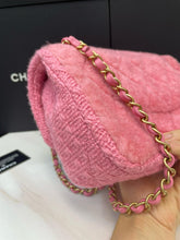 Load image into Gallery viewer, Chanel bag medium pink fur with gold hardware.

