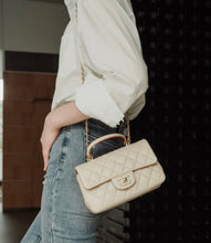 Load image into Gallery viewer, Chanel 23p beige / caramel two tone mini lambskin with gold hardware
