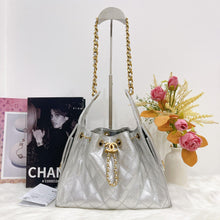 Load image into Gallery viewer, Chanel 25 small in silver caviar, aged gold hdw
