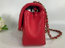 Load image into Gallery viewer, Chanel Pink/red mini lambskin with gold hdw.
