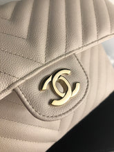 Load image into Gallery viewer, Chanel 18b ivory chevron caviar medium classic with light gold hdw
