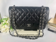 Load image into Gallery viewer, Chanel 21 series black caviar jumbo, silver hdw
